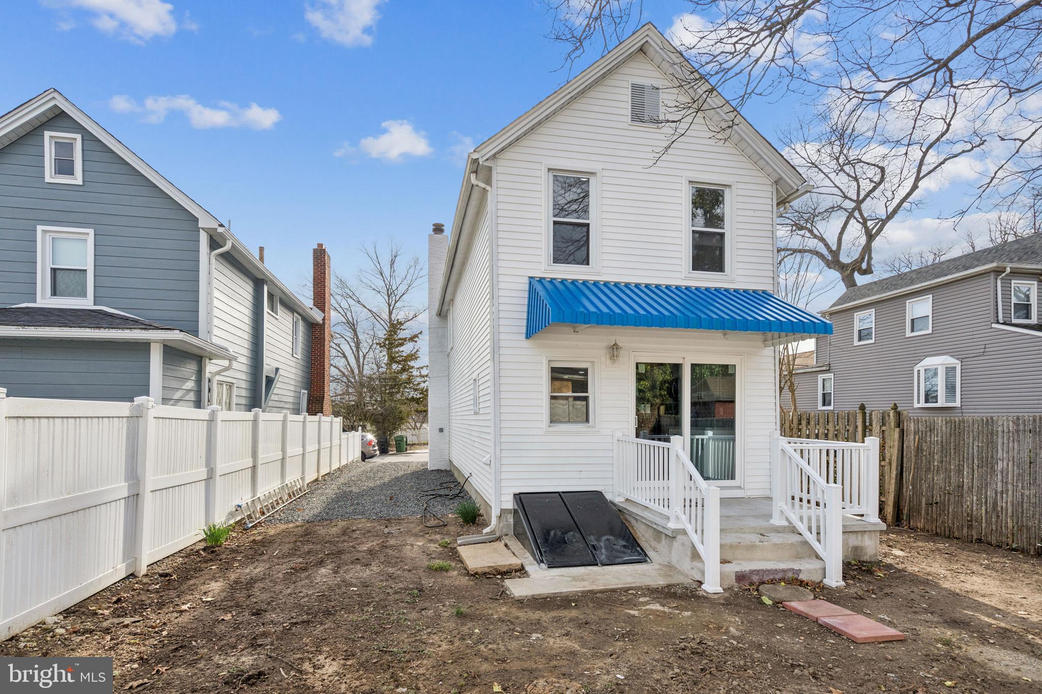 457 Wesley Avenue Pitman, NJ 08071 - Photo 25 of 25 a view of a white house with a yard and porch