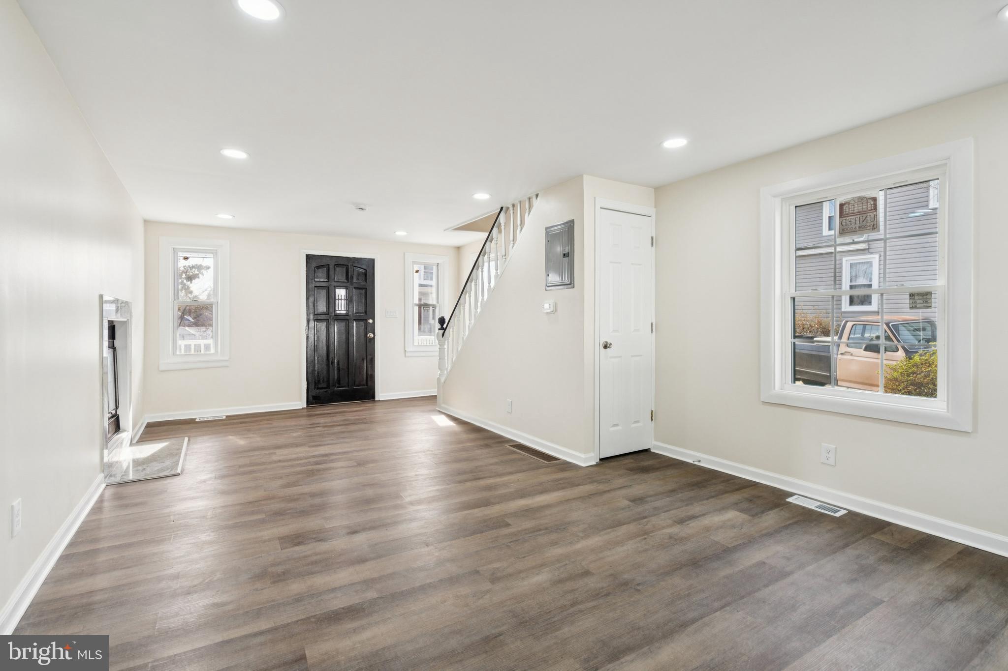 457 Wesley Avenue Pitman, NJ 08071 - Photo 7 of 25 a view of an empty room with wooden floor and a window