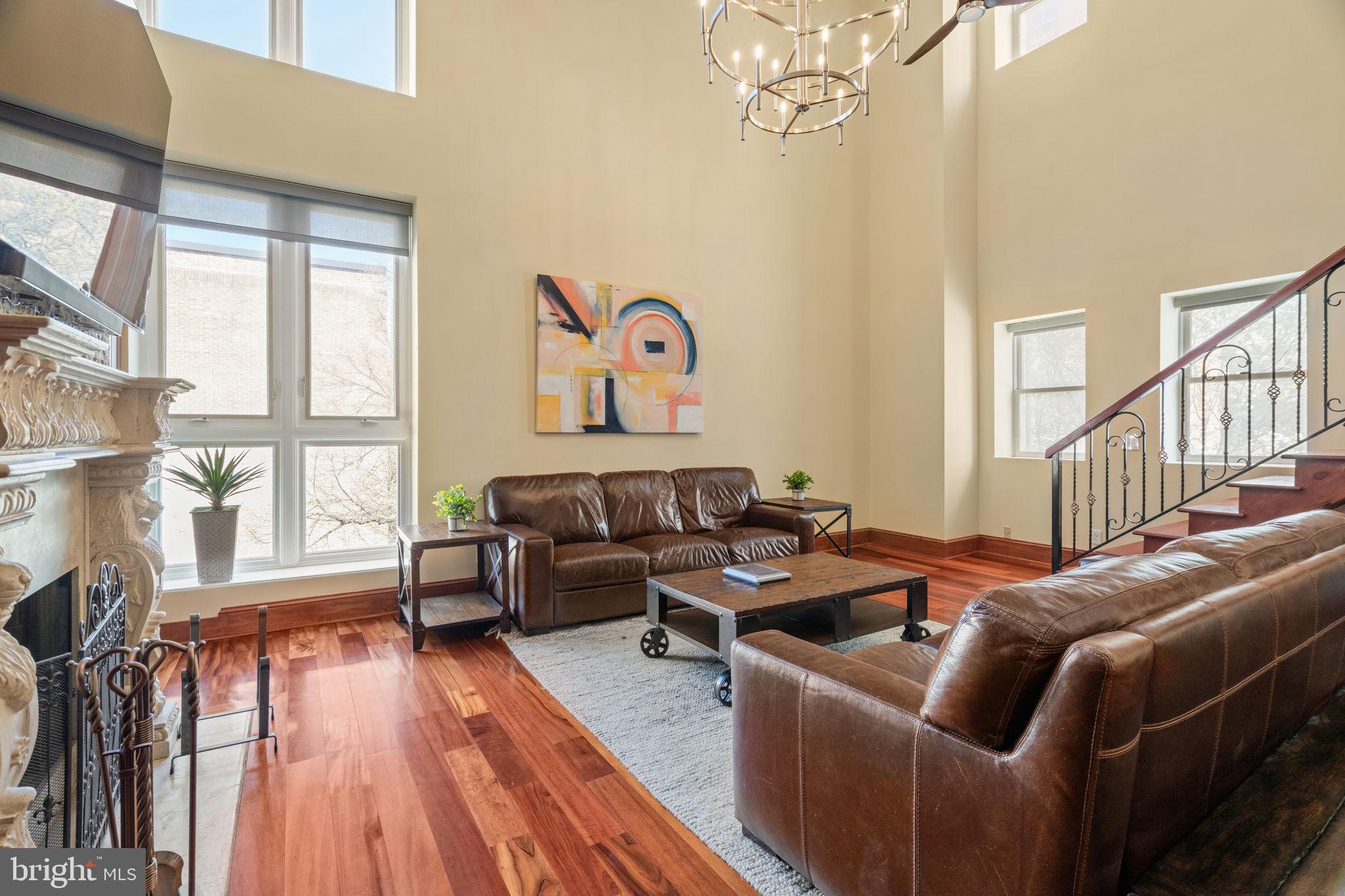 802 Locust Street, Unit 201 Philadelphia, PA 19107 - Photo 16 of 53 Spacious living area with modern art.
