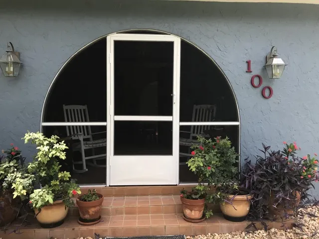 a kitchen with a stove and a microwave