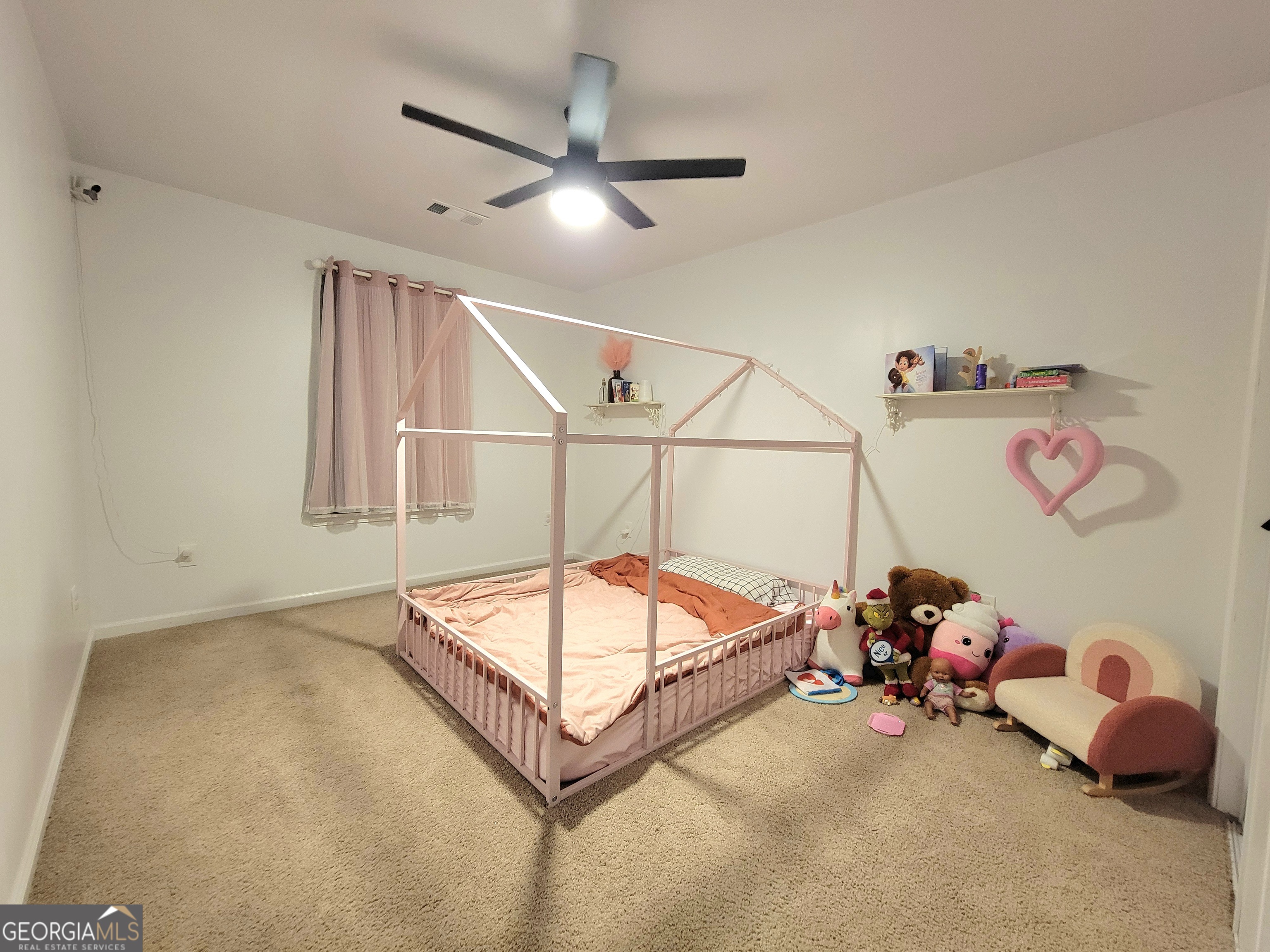 524 Louina Road Roanoke, AL 36274 - Photo 10 of 24 a room with toys and a chandelier fan