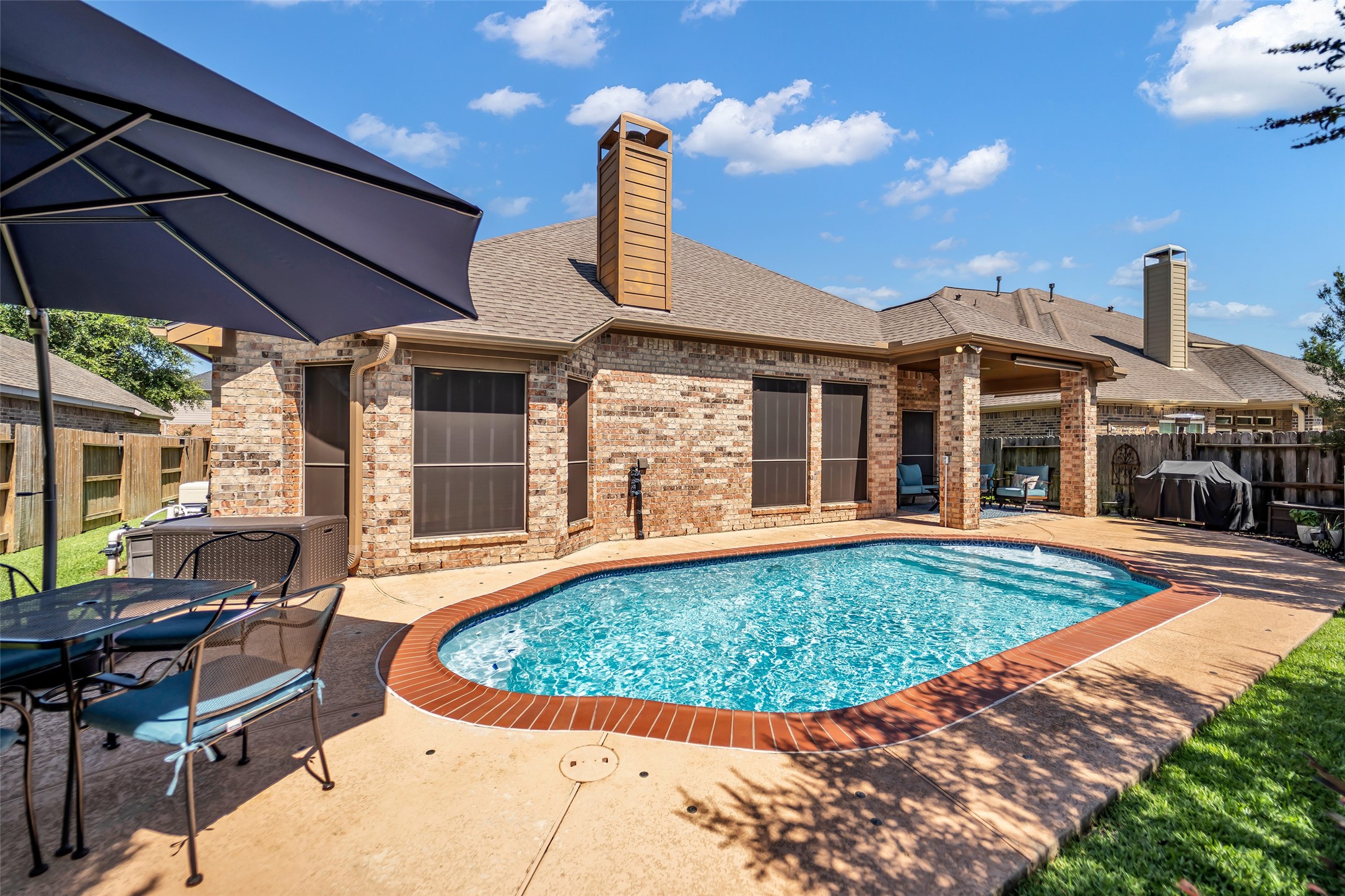 12006 Bayou Junction Road Cypress, TX 77433 - Photo 28 of 38 ALL brick; lots of areas for seating and some green space!