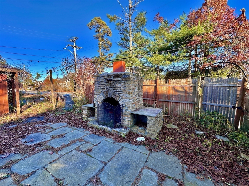 4 Martin Street Wareham, MA 02532 - Photo 25 of 33 a front view of a house with a yard