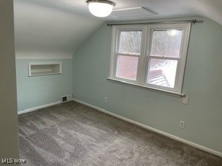 6074 Crossview Road Independence, OH 44131 - Photo 16 of 28 Upstairs bedroom room with carpet floors and lofted ceiling