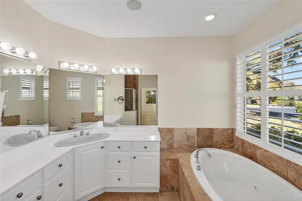 a view of hallway with windows