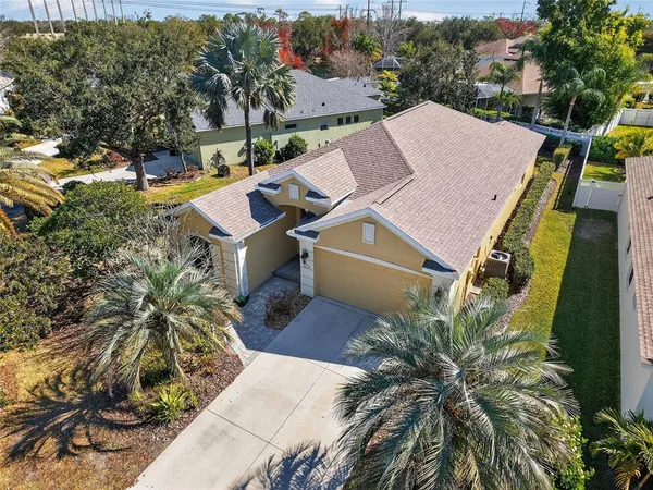 an aerial view of a house with a garden