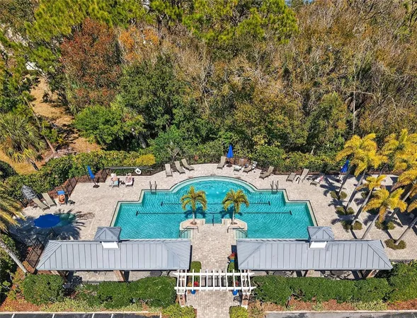 a view of a livingroom with furniture and a flat screen tv