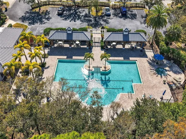 a view of a chairs and table in the patio