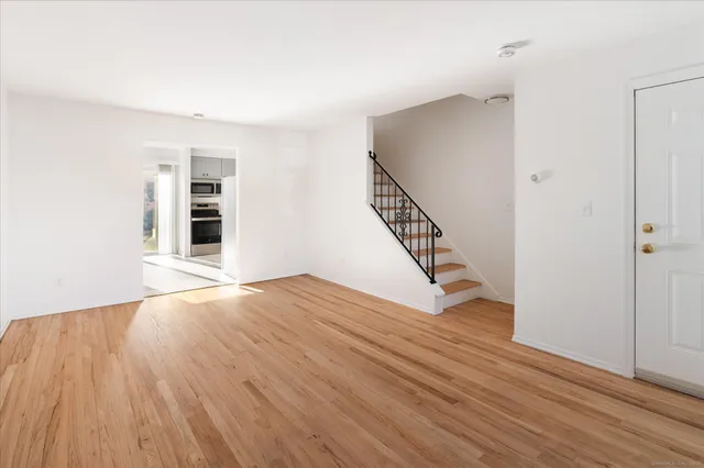 wooden floor in an empty room with a workspace