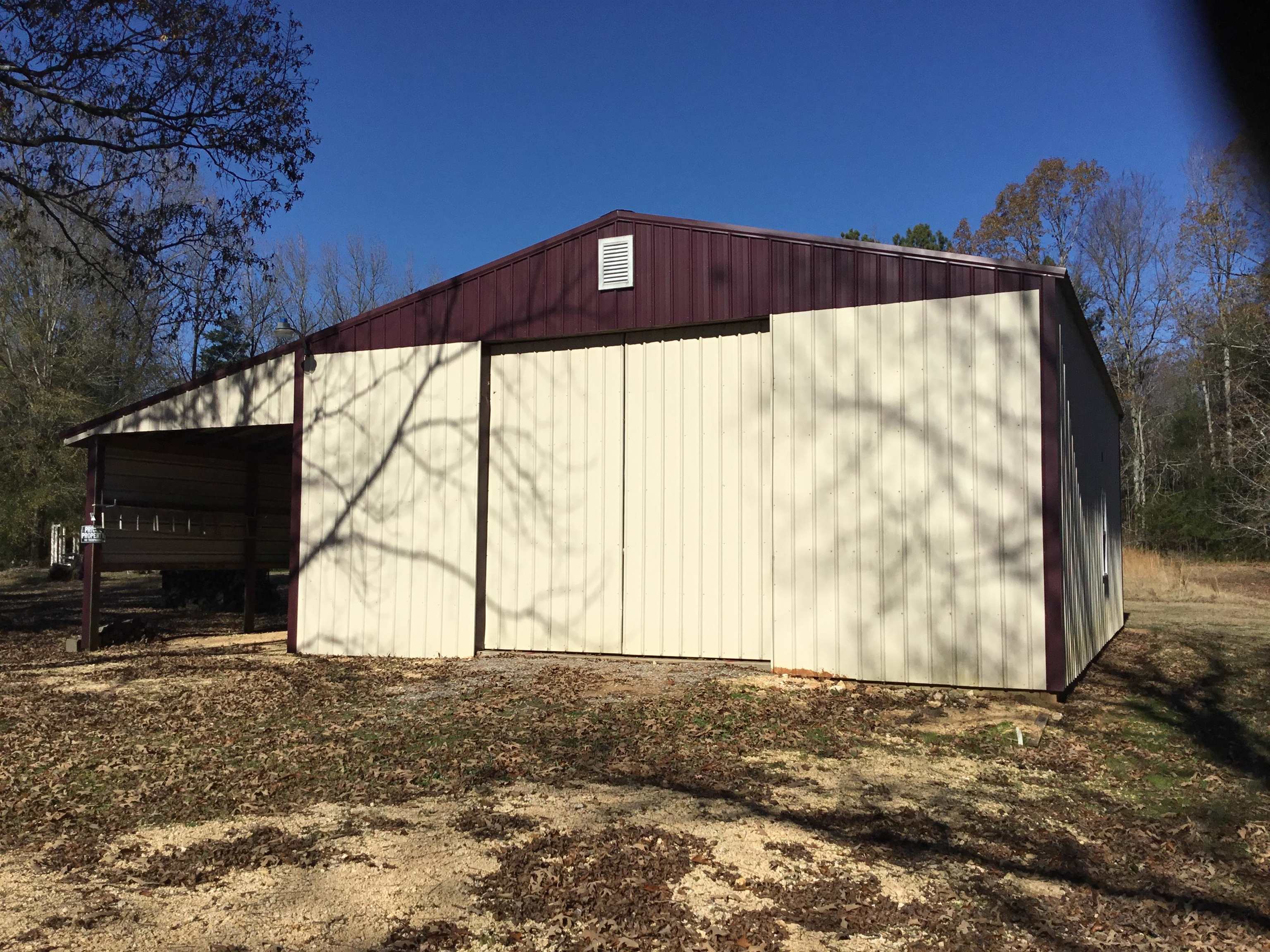 47735 69th Highway Saltillo, TN 38370 - Photo 17 of 21 a front view of a house with a yard