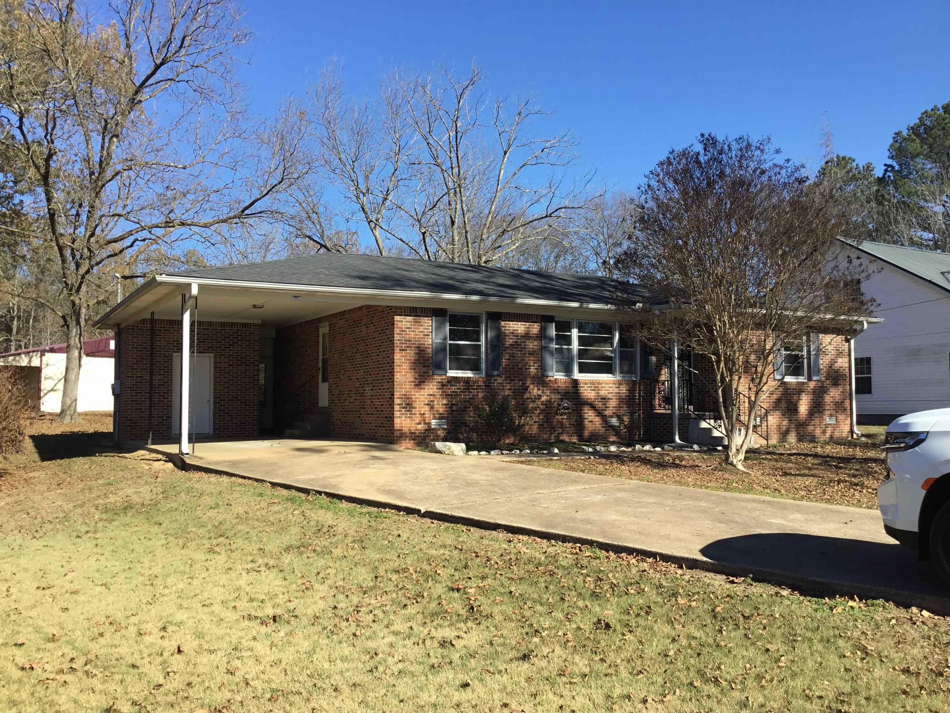 47735 69th Highway Saltillo, TN 38370 - Photo 2 of 21 a front view of a building with a garden