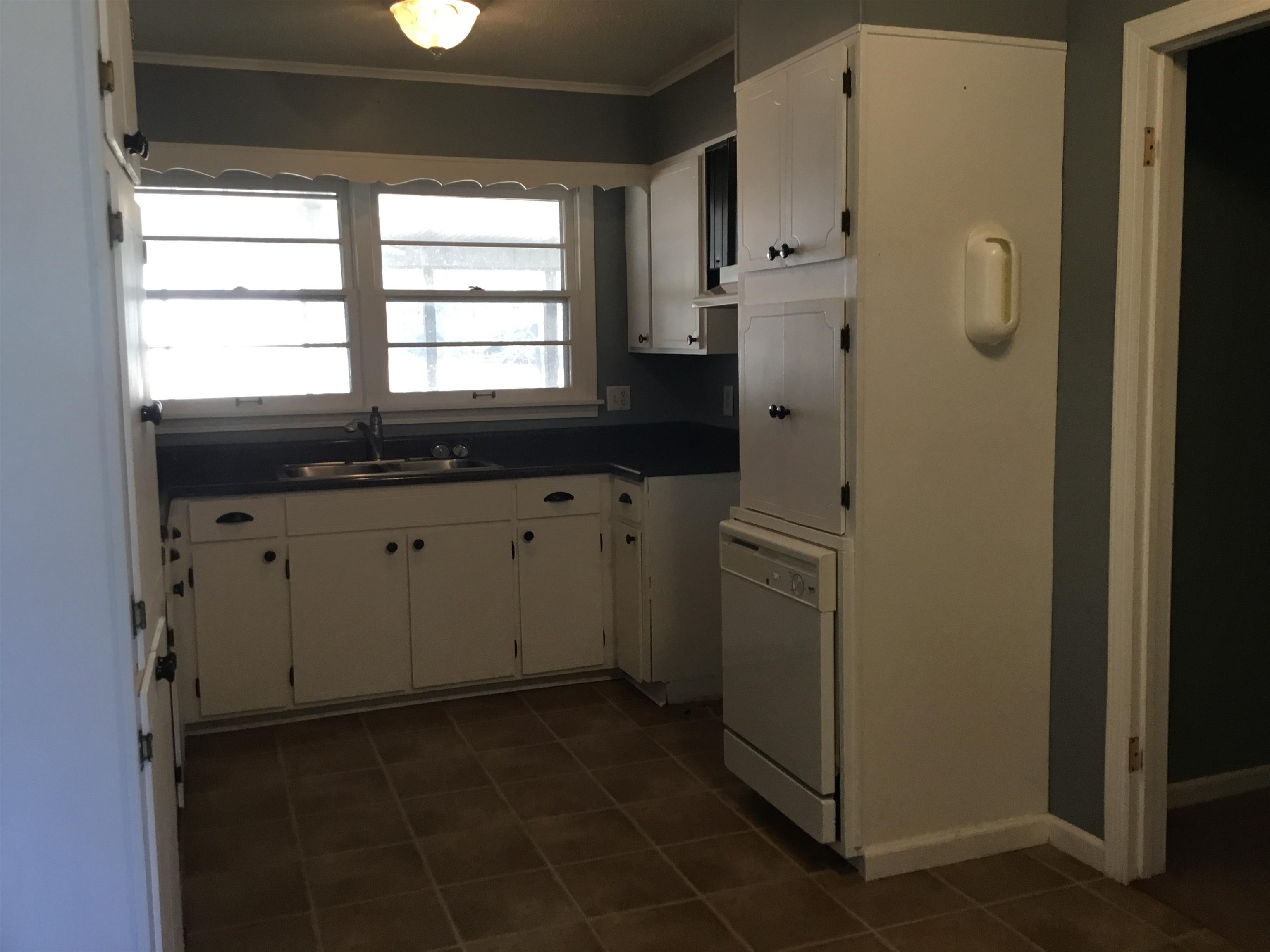 47735 69th Highway Saltillo, TN 38370 - Photo 7 of 21 a kitchen with stainless steel appliances a refrigerator sink and cabinets