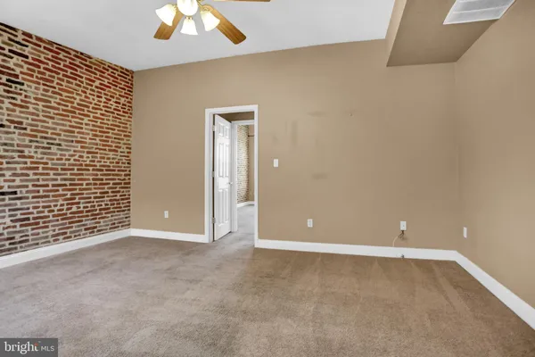 en empty room with an entryway