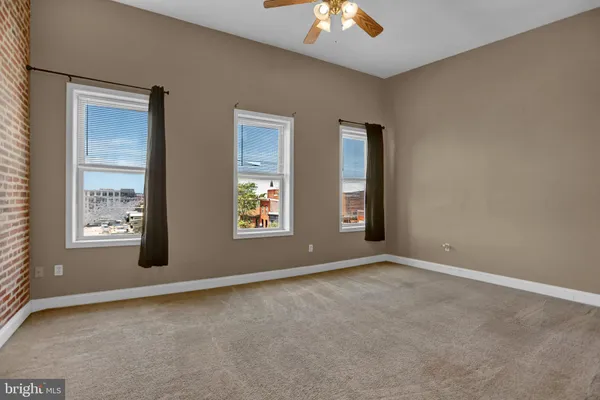 an empty room with windows