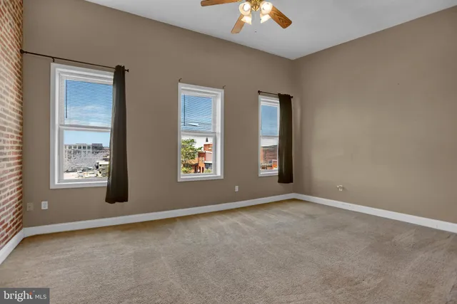 an empty room with windows