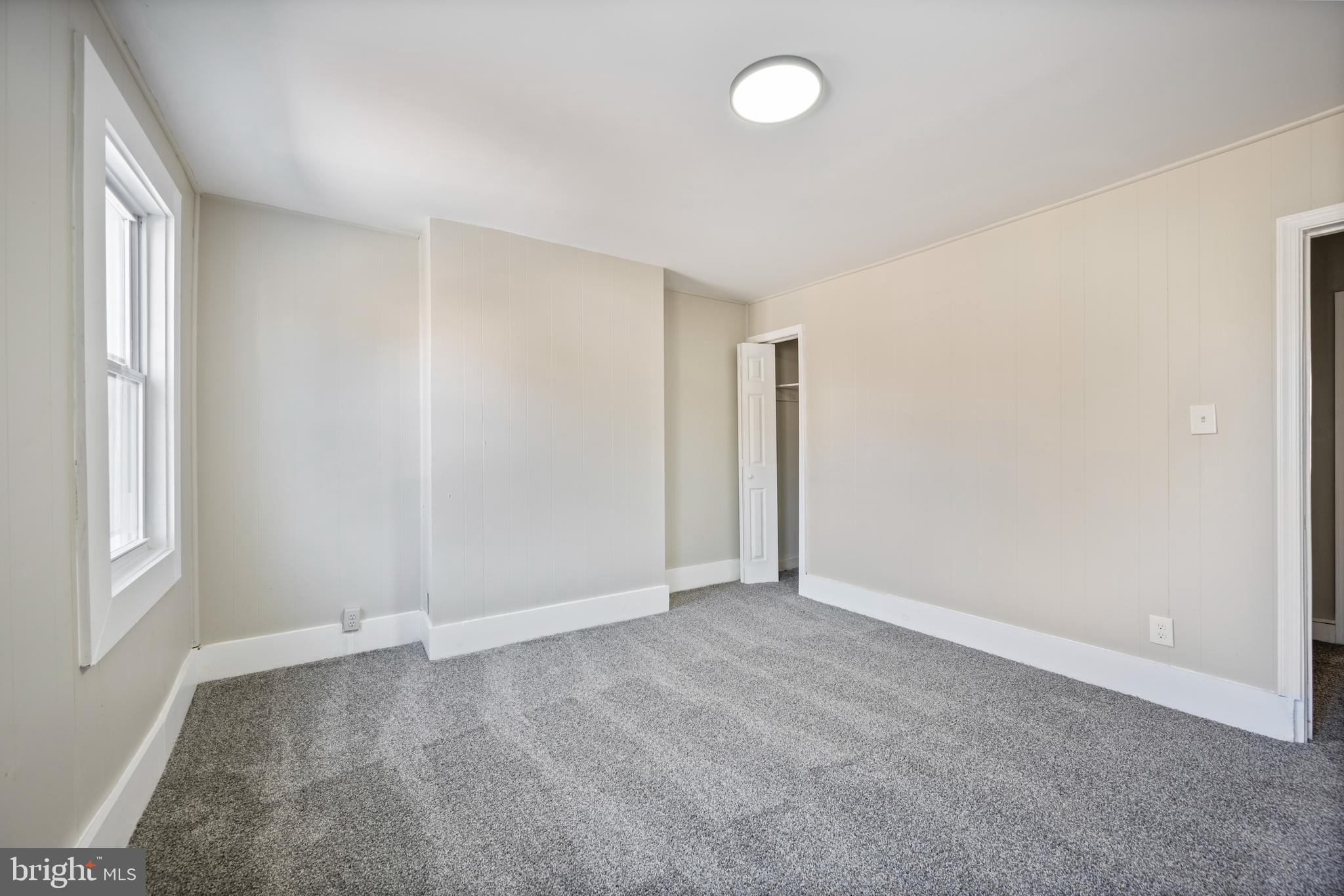 1038 Brantley Avenue Baltimore, MD 21217 - Photo 29 of 38 an empty room with windows