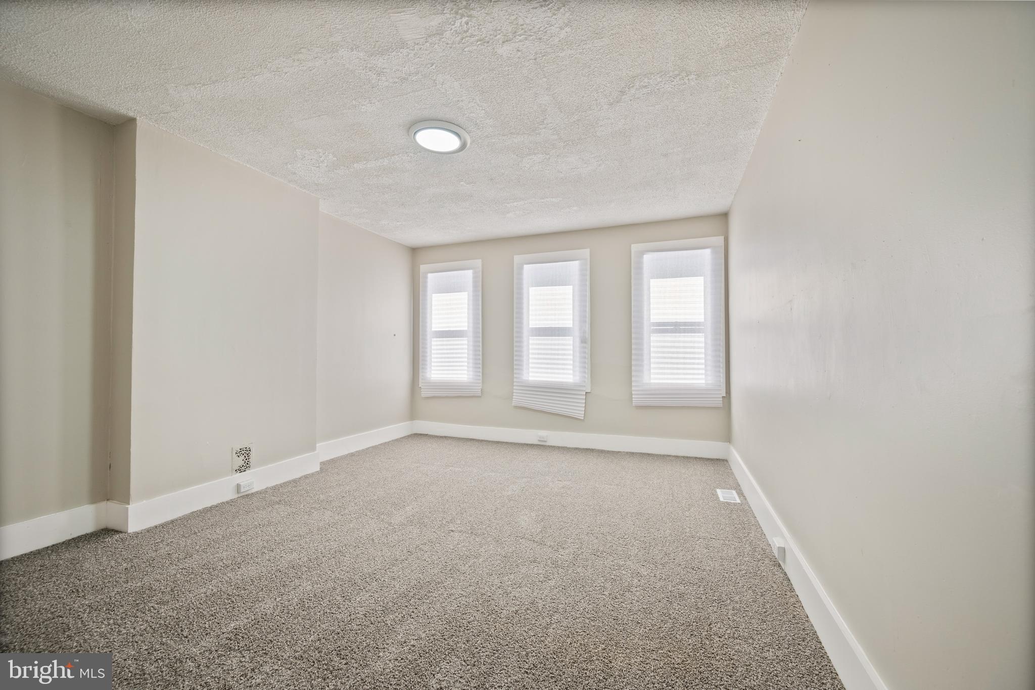 1038 Brantley Avenue Baltimore, MD 21217 - Photo 30 of 38 an empty room with windows