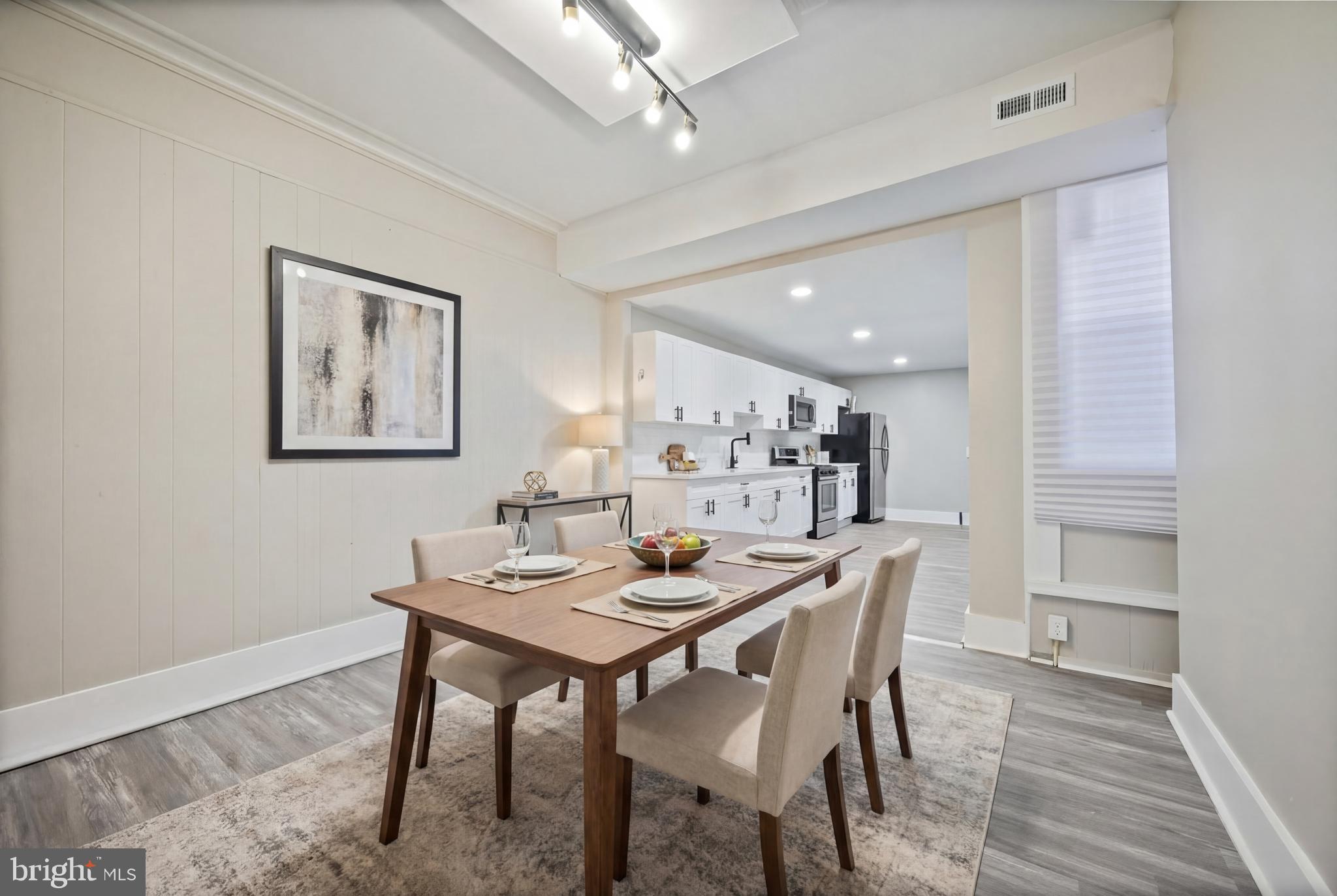 1038 Brantley Avenue Baltimore, MD 21217 - Photo 3 of 38 a dining room with furniture and window