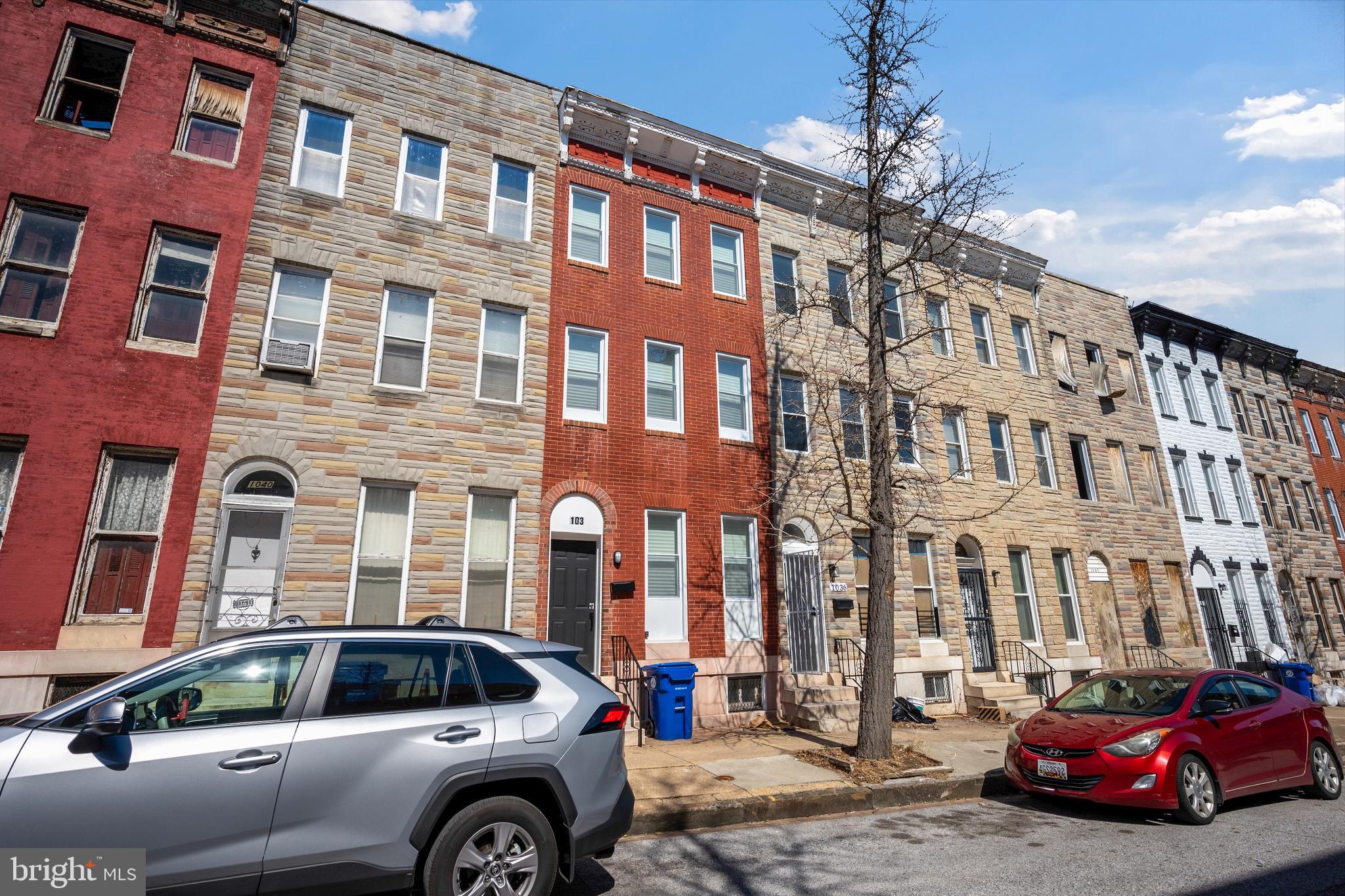1038 Brantley Avenue Baltimore, MD 21217 - Photo 36 of 38 a car parked in front of a building