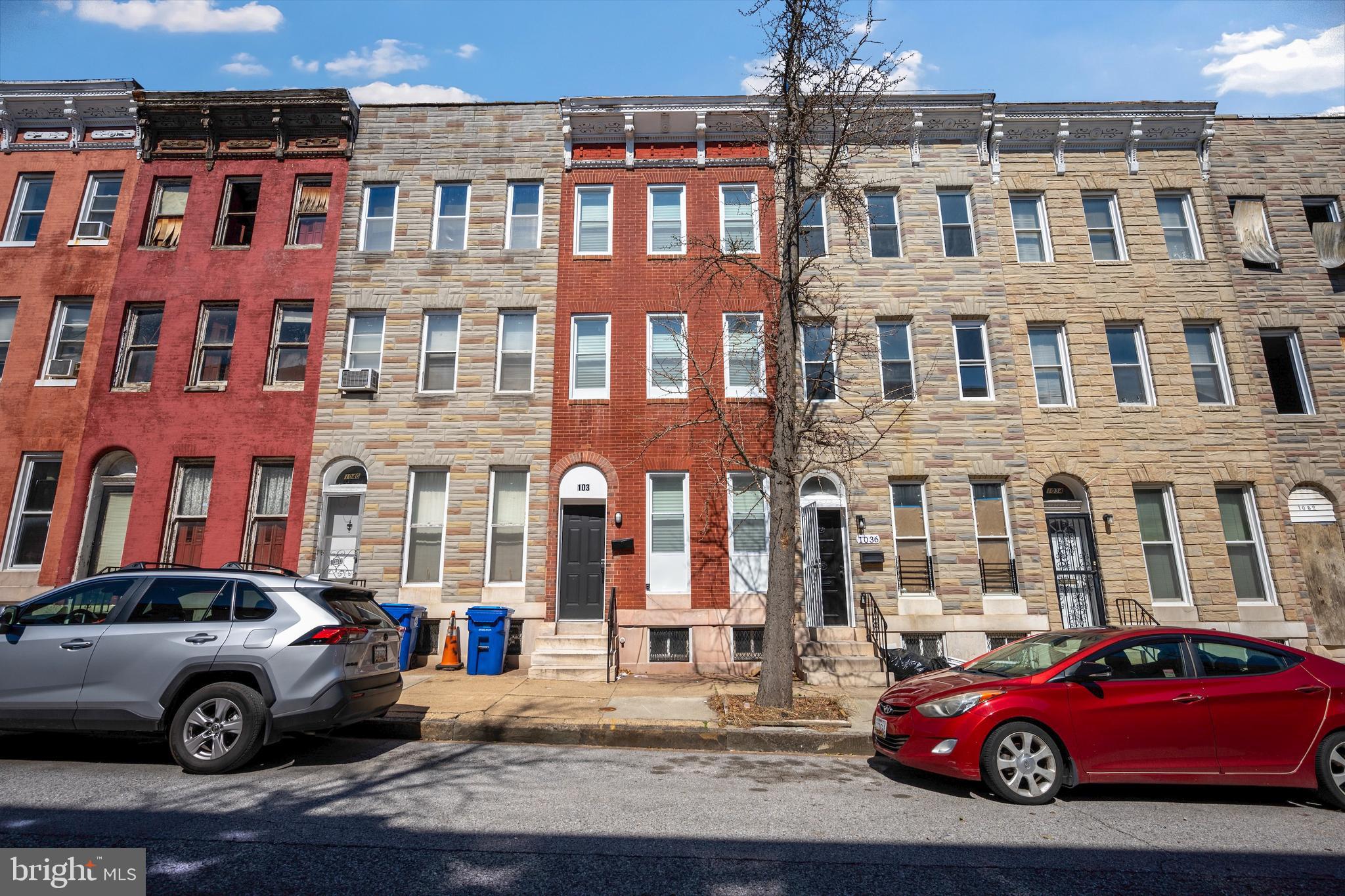 1038 Brantley Avenue Baltimore, MD 21217 - Photo 38 of 38 a car parked in front of a building