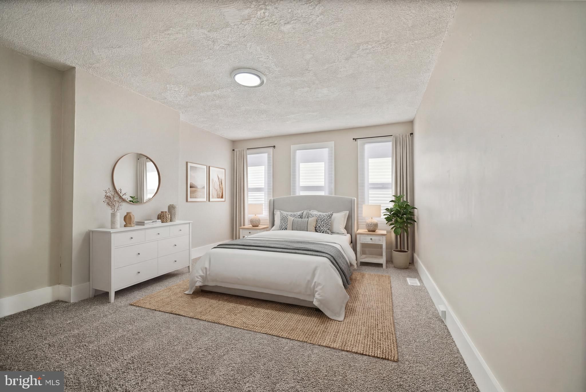 1038 Brantley Avenue Baltimore, MD 21217 - Photo 7 of 38 a spacious bedroom with a bed a window and dresser