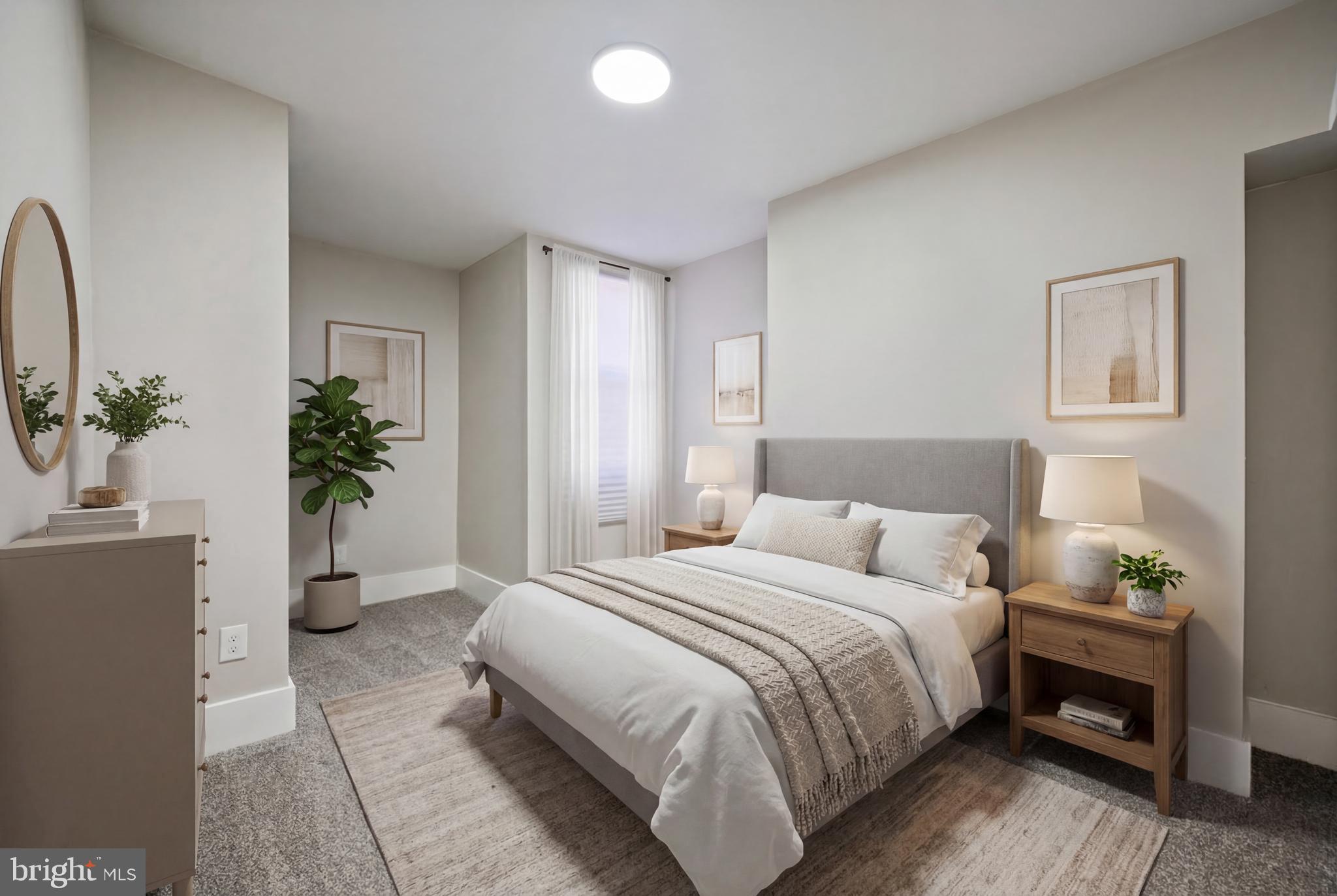 1038 Brantley Avenue Baltimore, MD 21217 - Photo 8 of 38 a bedroom with a bed and a potted plant