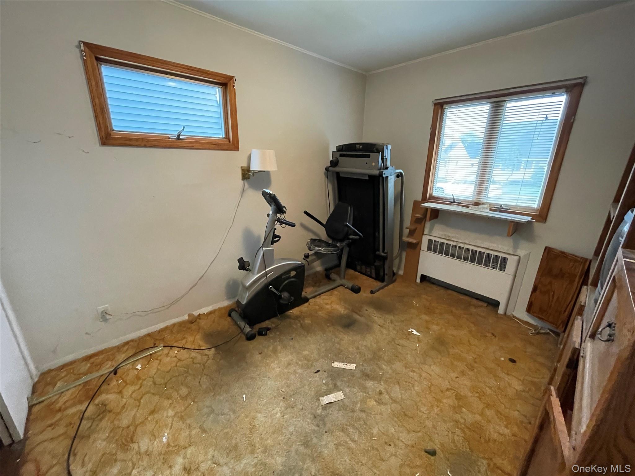 2043 Paddock Road Seaford, NY 11783 - Photo 11 of 25 a view of a room with gym equipment