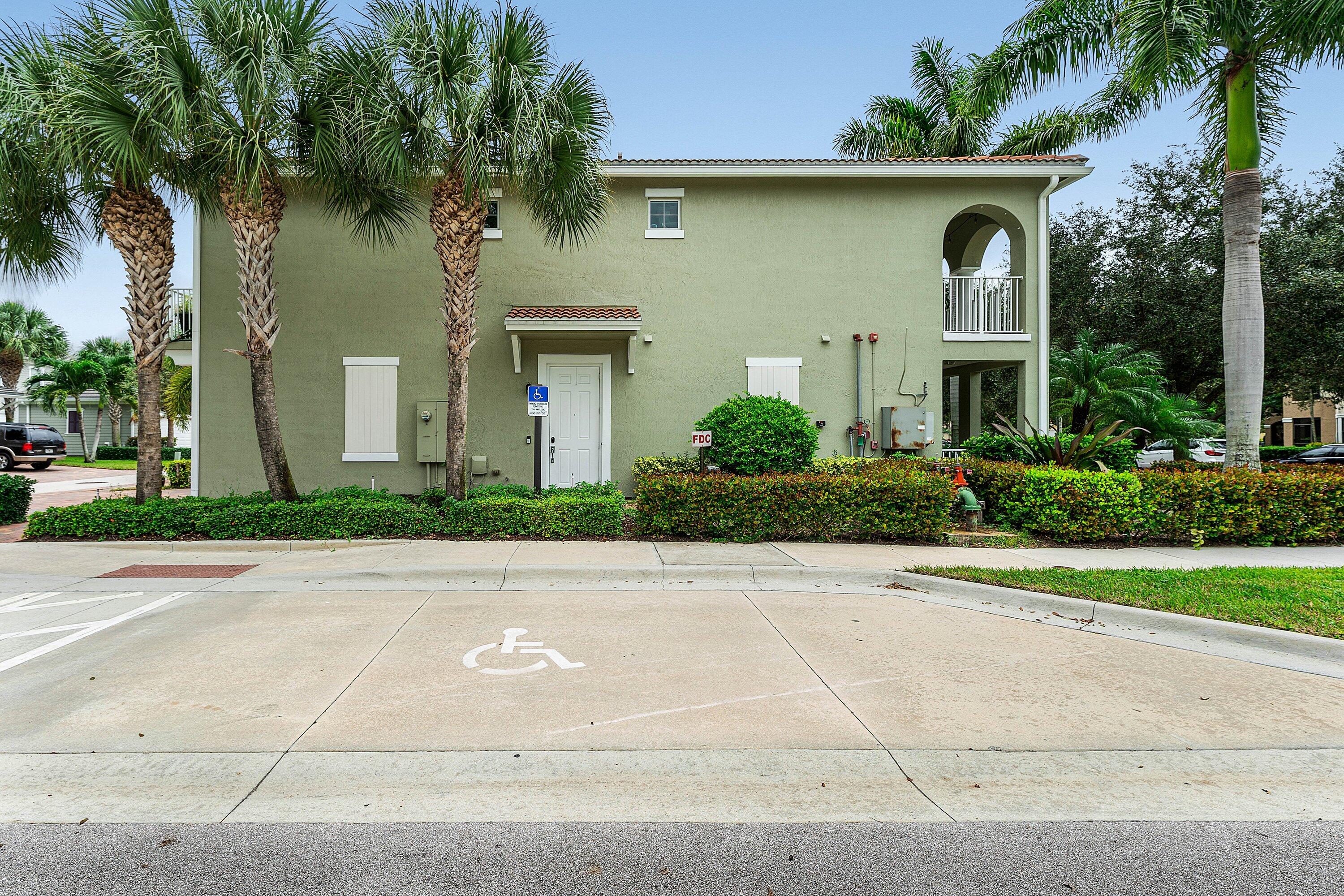 1056 Community Drive Jupiter, FL 33458 - Photo 33 of 50 front view of a house
