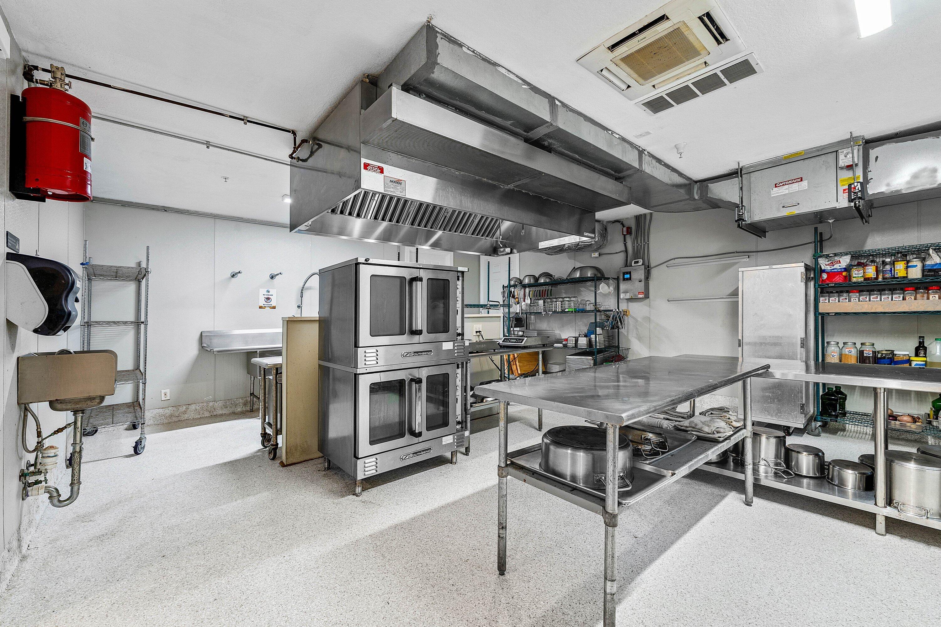 1056 Community Drive Jupiter, FL 33458 - Photo 36 of 50 a view of storage and utility room