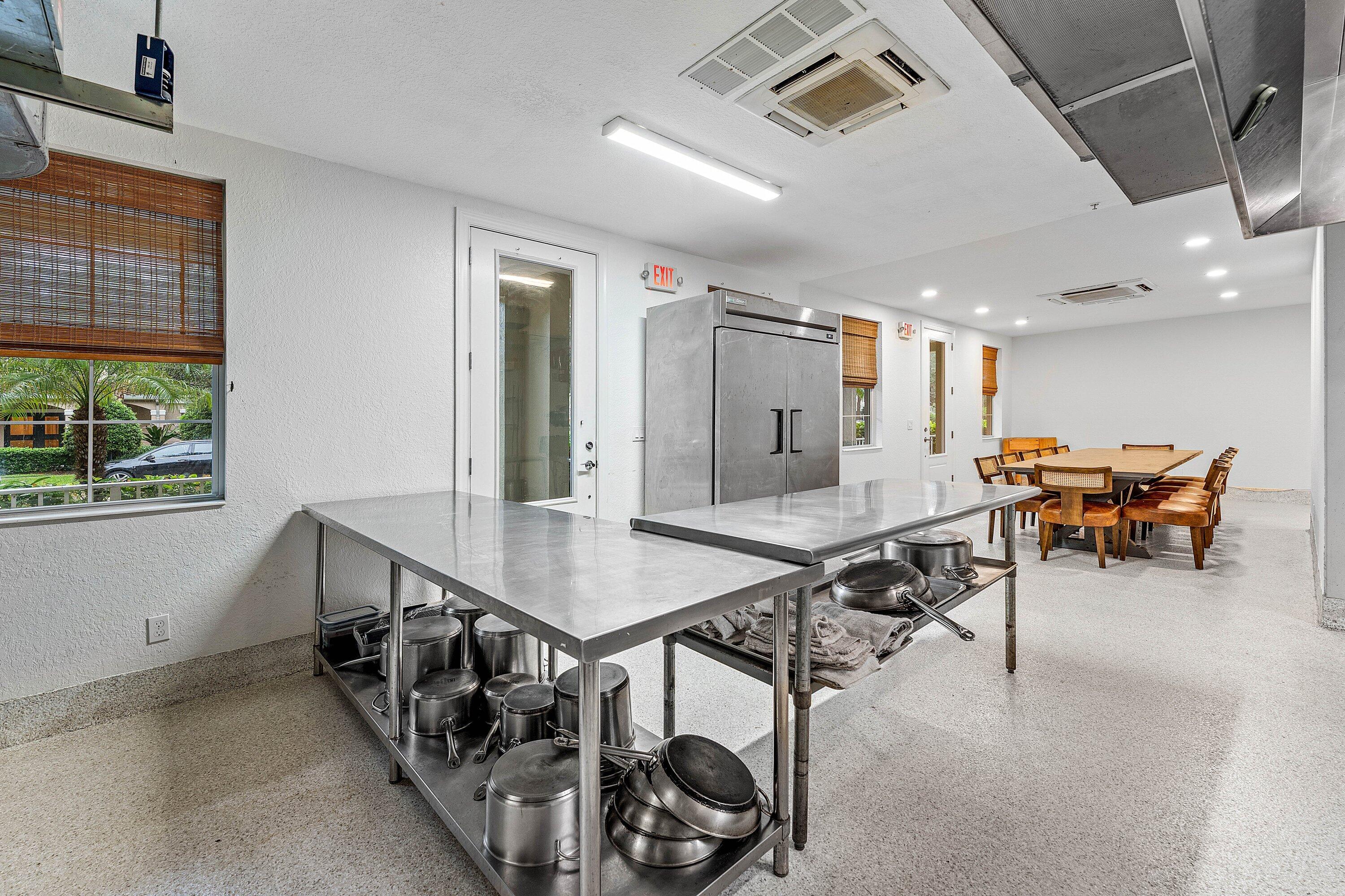 1056 Community Drive Jupiter, FL 33458 - Photo 38 of 50 a room with furniture and a large window