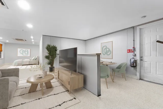 a view of an chairs and table in the patio