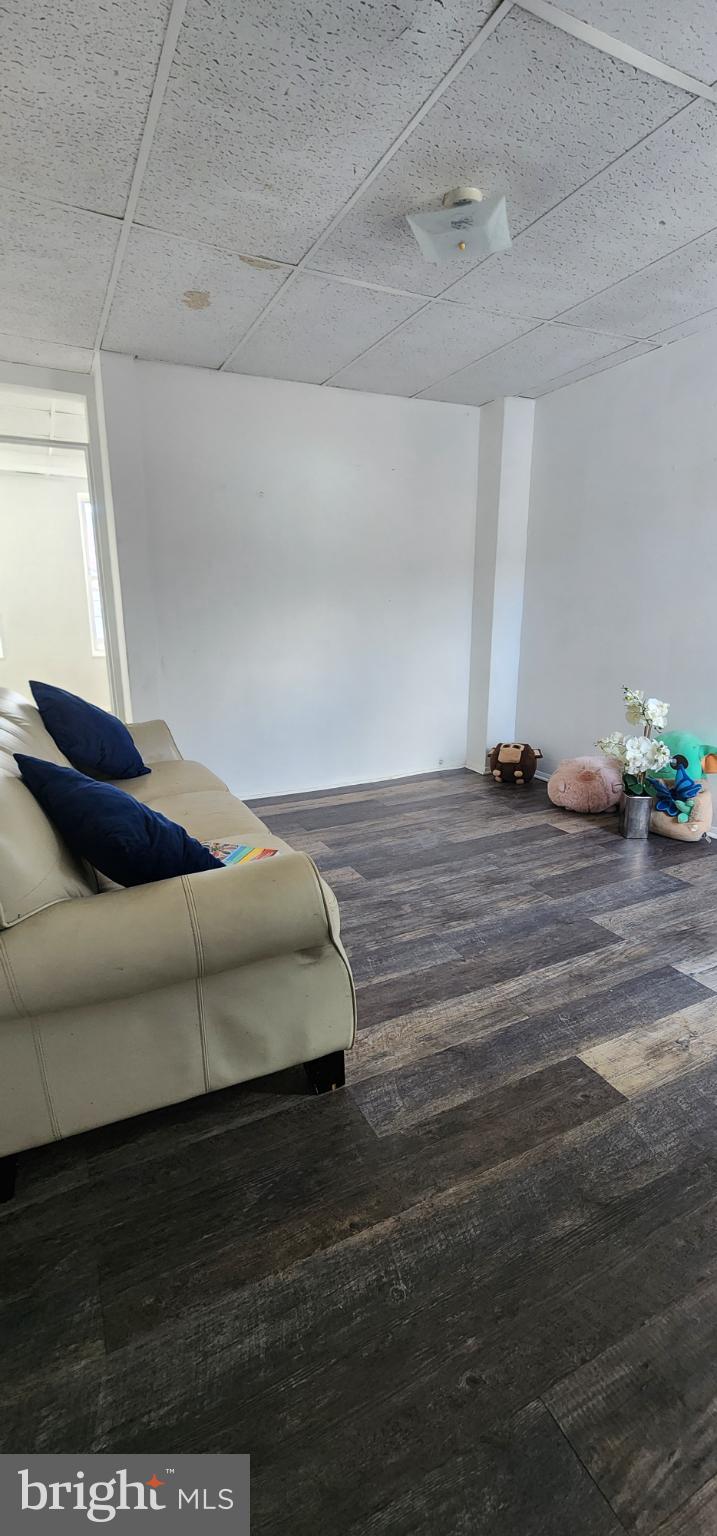 645 North 10th Street Reading, PA 19604 - Photo 19 of 27 a living room with hard wood flooring