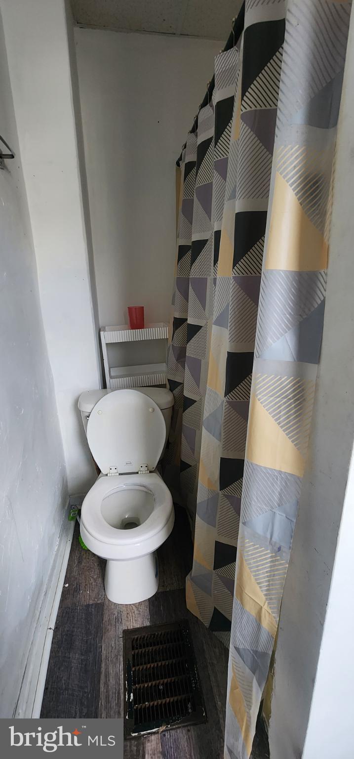 645 North 10th Street Reading, PA 19604 - Photo 22 of 27 a bathroom with a toilet and a shower