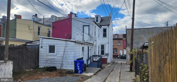 a view of a street with brick building