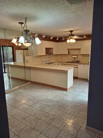 $329,900 | 6520 Southeast Windsong Lane, Unit 728, Stuart, FL 34997