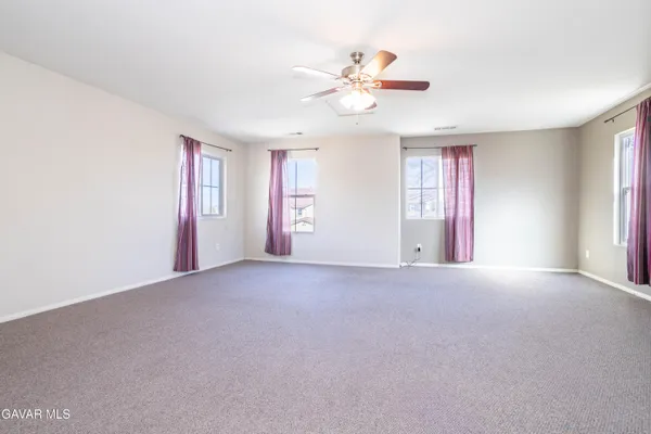 a view of a livingroom with a fan