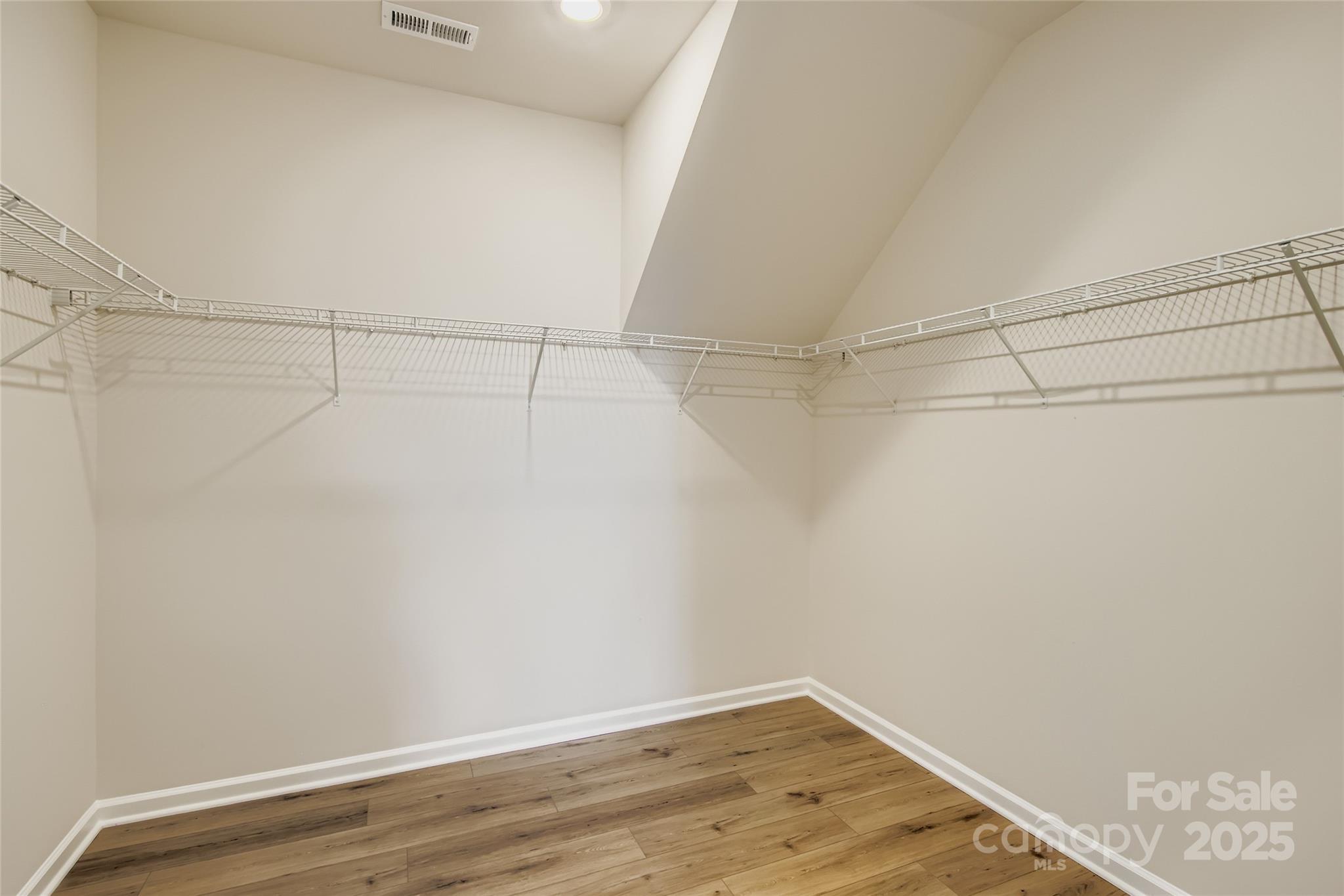 2831 Morning Song Way Lancaster, SC 29720 - Photo 9 of 18 a view of a room with wooden floor