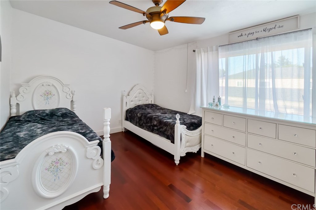 2419 Minuteman Way Costa Mesa, CA 92626 - Photo 20 of 26 a bedroom with bed and window