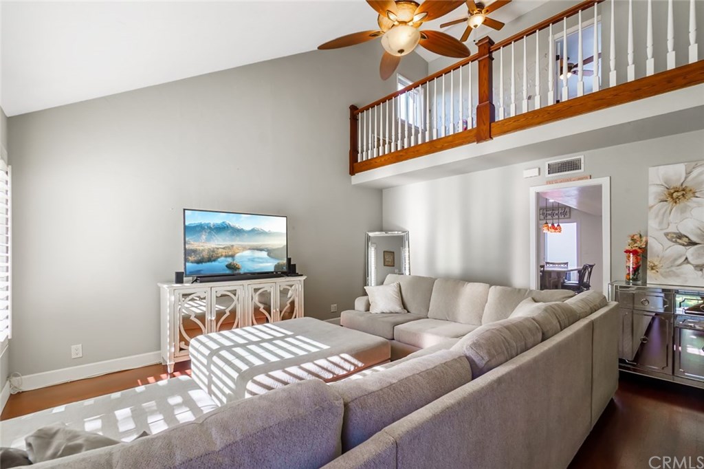 2419 Minuteman Way Costa Mesa, CA 92626 - Photo 5 of 26 a view of a livingroom with furniture and windows