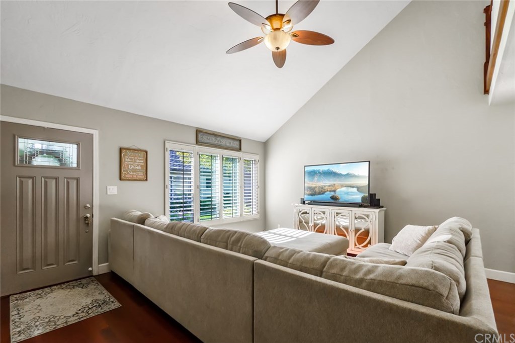 2419 Minuteman Way Costa Mesa, CA 92626 - Photo 6 of 26 a living room with furniture and a window