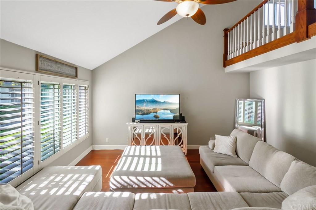 2419 Minuteman Way Costa Mesa, CA 92626 - Photo 7 of 26 a living room with furniture and a window
