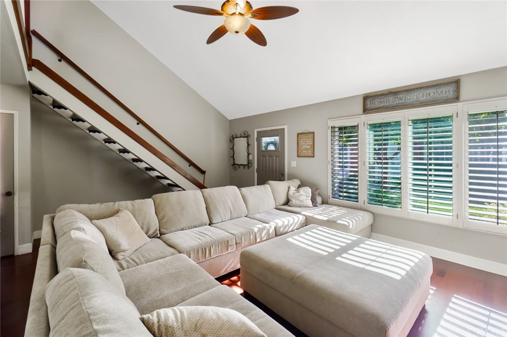 2419 Minuteman Way Costa Mesa, CA 92626 - Photo 8 of 26 a living room with furniture and a window