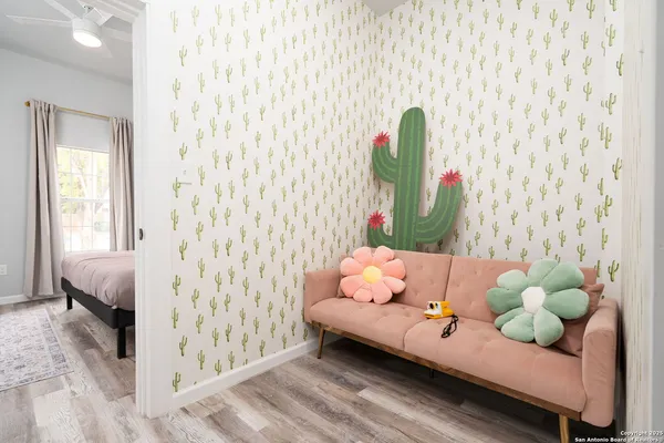 a bed room with a bed and a window