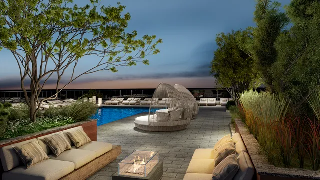 a view of a patio with couches table and chairs and potted plants