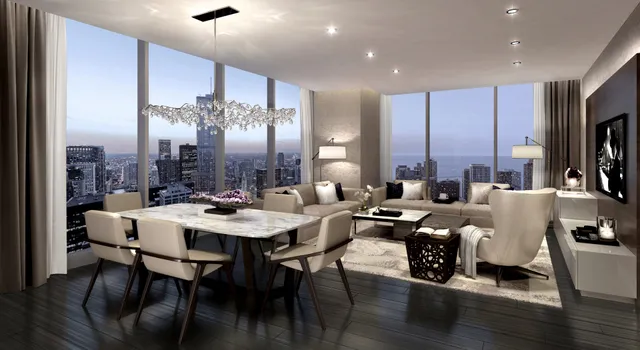 a view of a dining room with furniture a chandelier and wooden floor