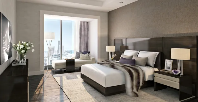 a bedroom with bed and a large window