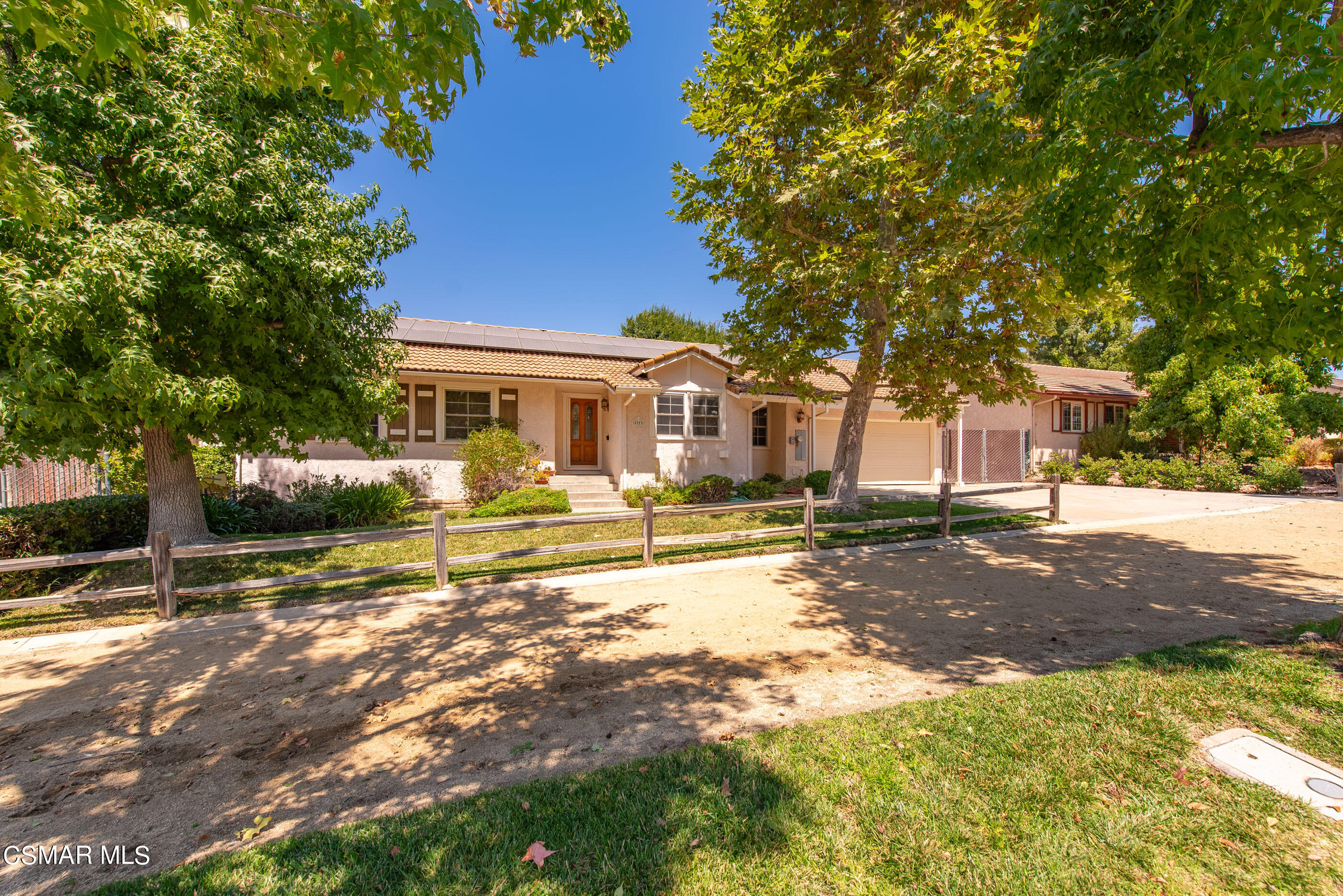 1217 Rambling Road Simi Valley, CA 93065 - Photo 1 of 64 a view of a house with a yard