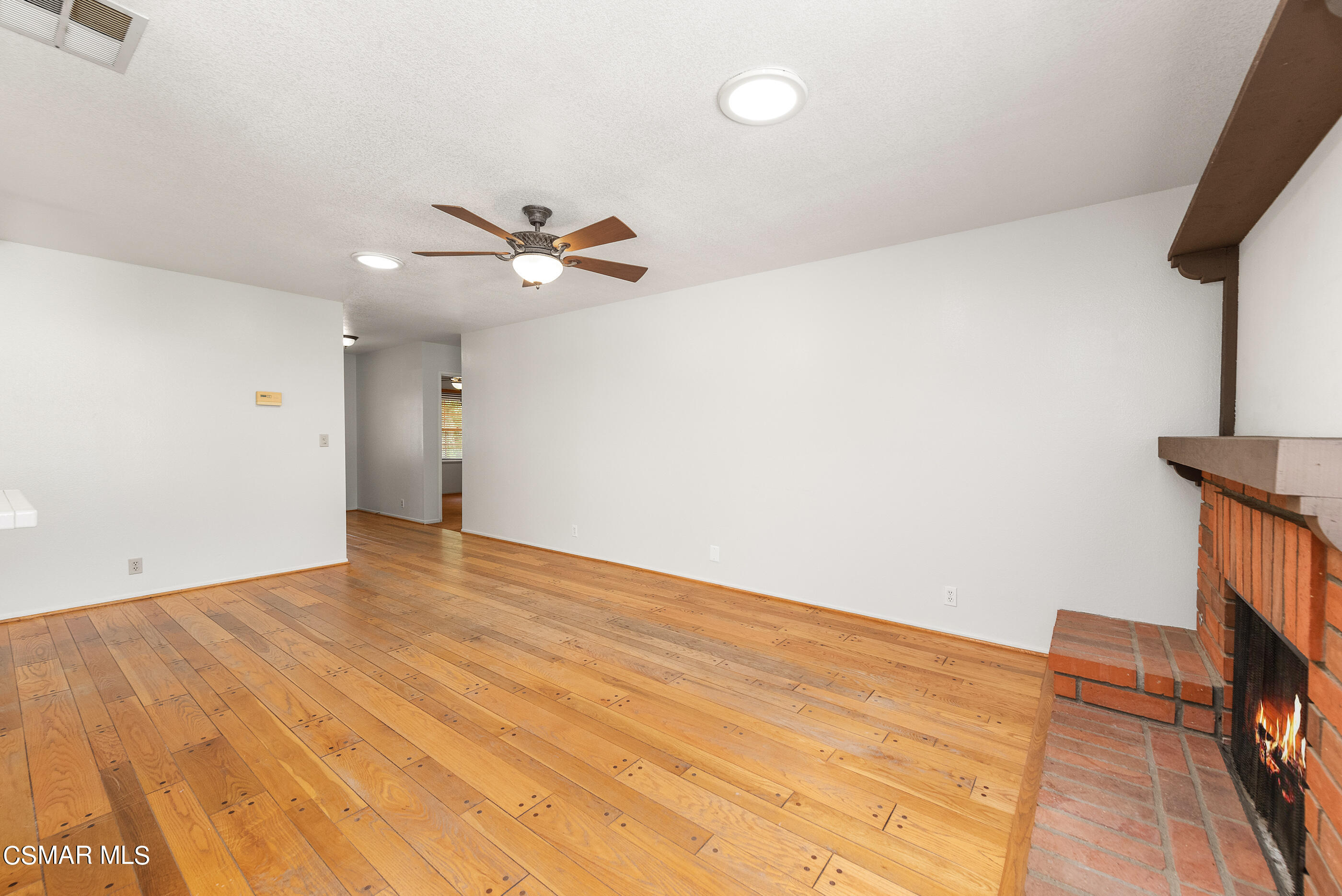 1217 Rambling Road Simi Valley, CA 93065 - Photo 8 of 64 wooden floor in an empty room