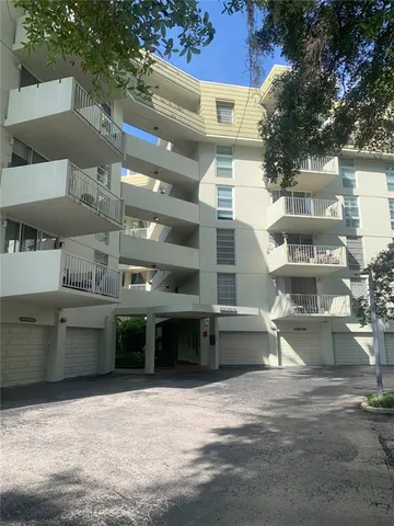 a kitchen with stainless steel appliances granite countertop a stove and a refrigerator