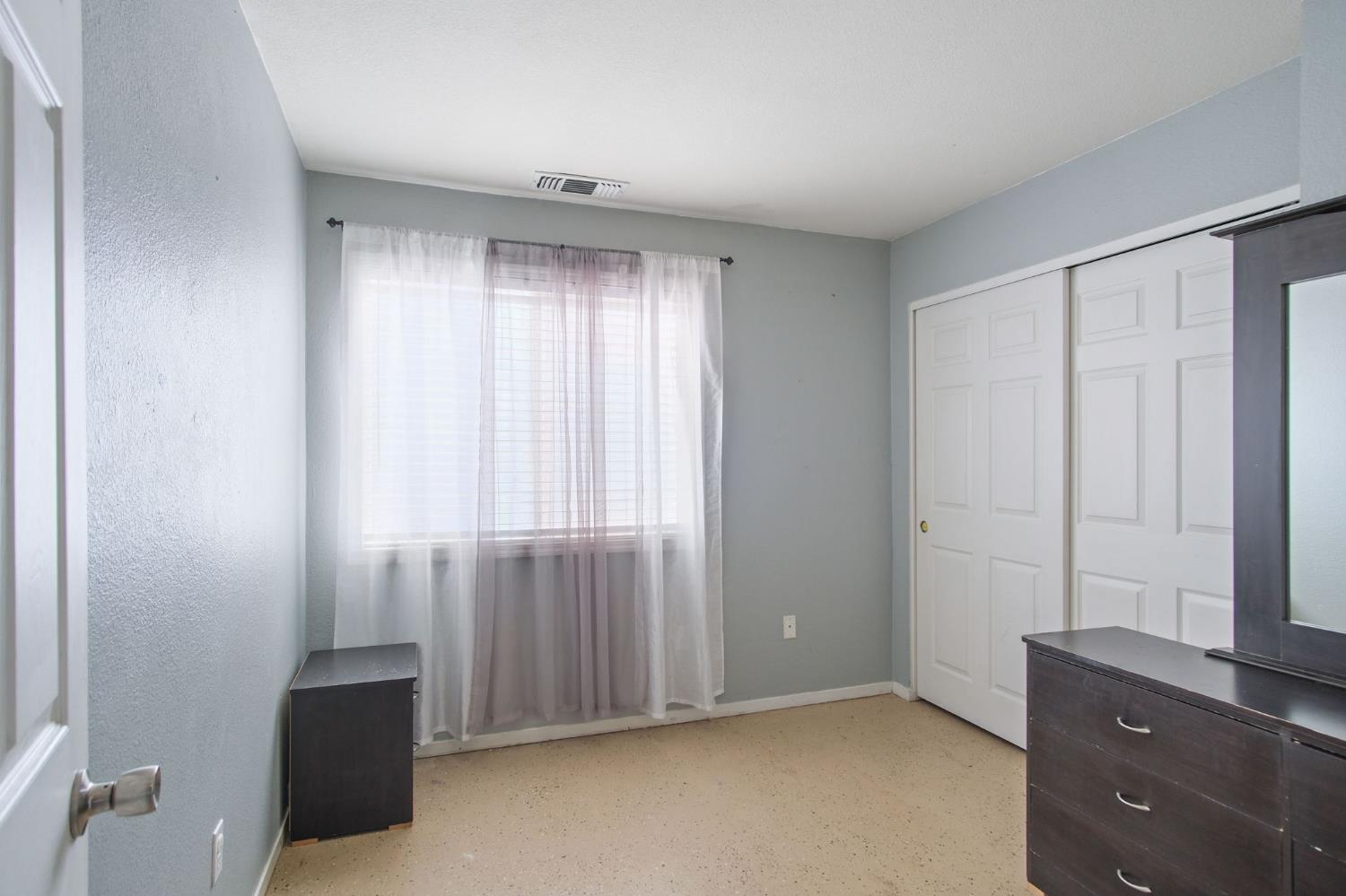 810 River Raft Court Modesto, CA 95351 - Photo 19 of 32 a view of an empty room with a window